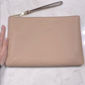 Large Kate Spade wristlet. Blush pink